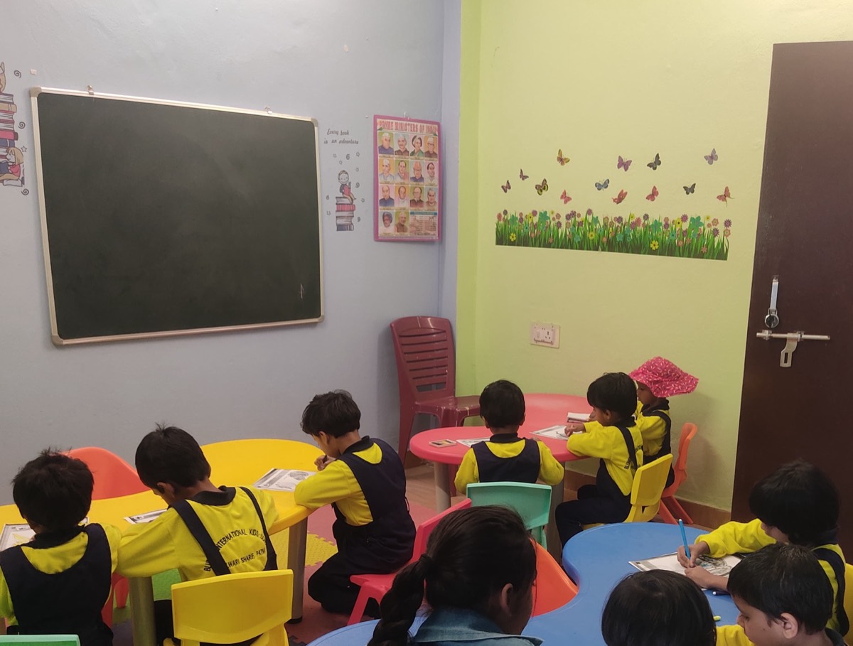 Classroom with blackboard and butterfly wall decorations