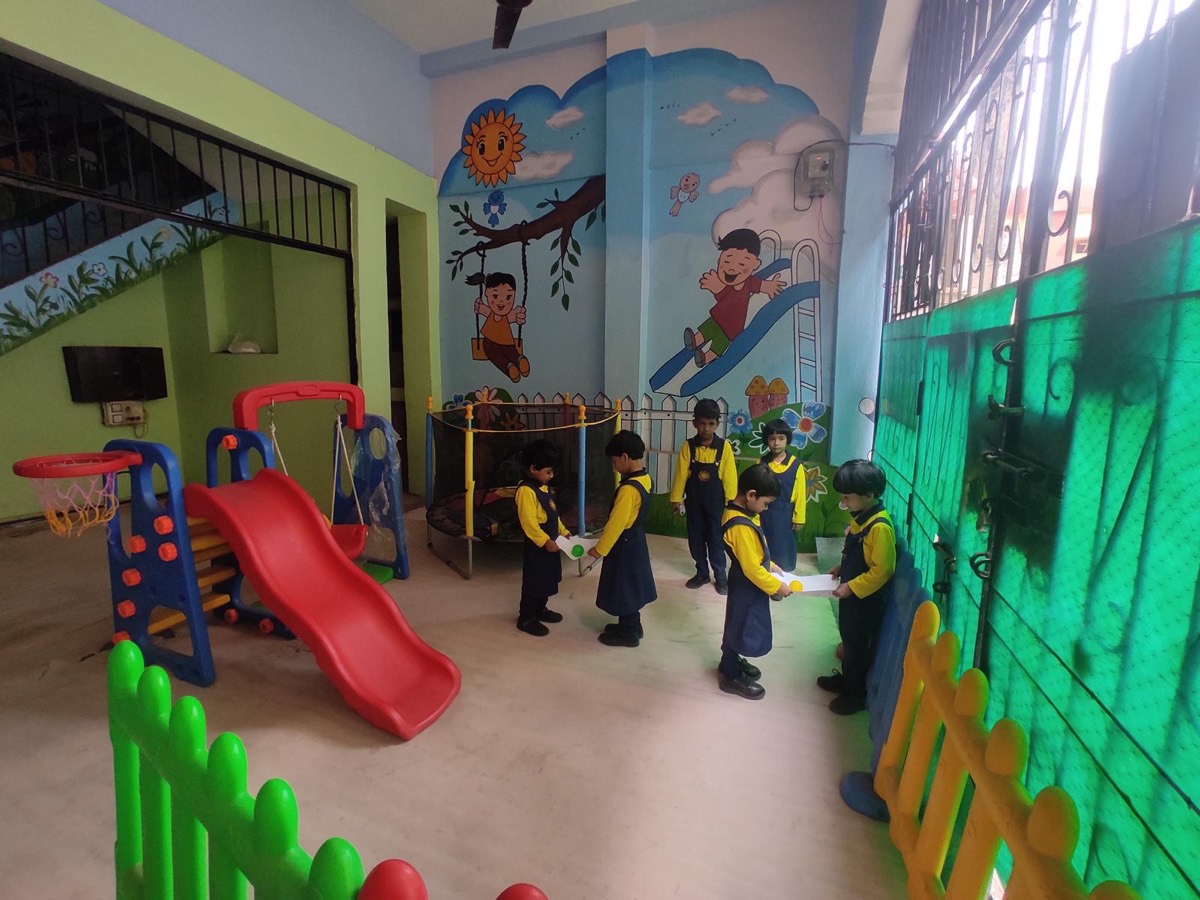 Children playing in the indoor play area at Blumen